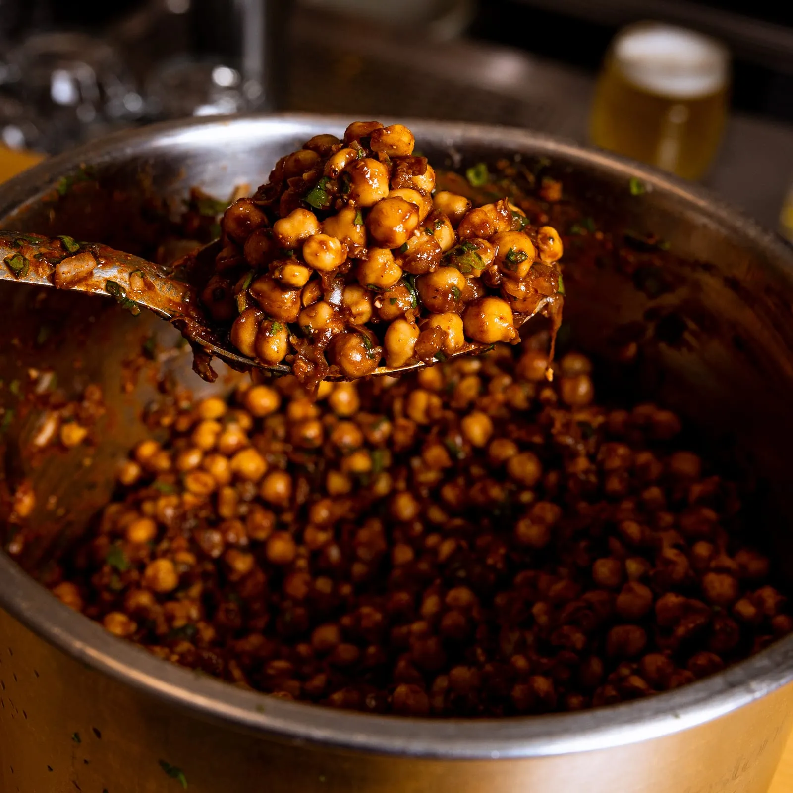 A pot of roasted chickpeas being scooped