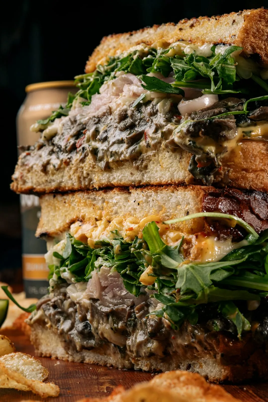A close crop of a mushroom and arugula sandwich